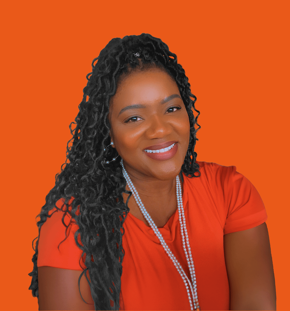 Andrea LeShea Smith, an African American woman with long curly hair, wearing an orange top and pearl necklace, smiling against an orange background.